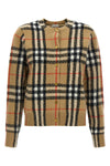 the burberry clara cardigan defines the codes of luxury knitwear through impec
