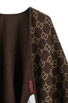guccis gg jacquard pure wool cape defines a fluid and enveloping silhouette