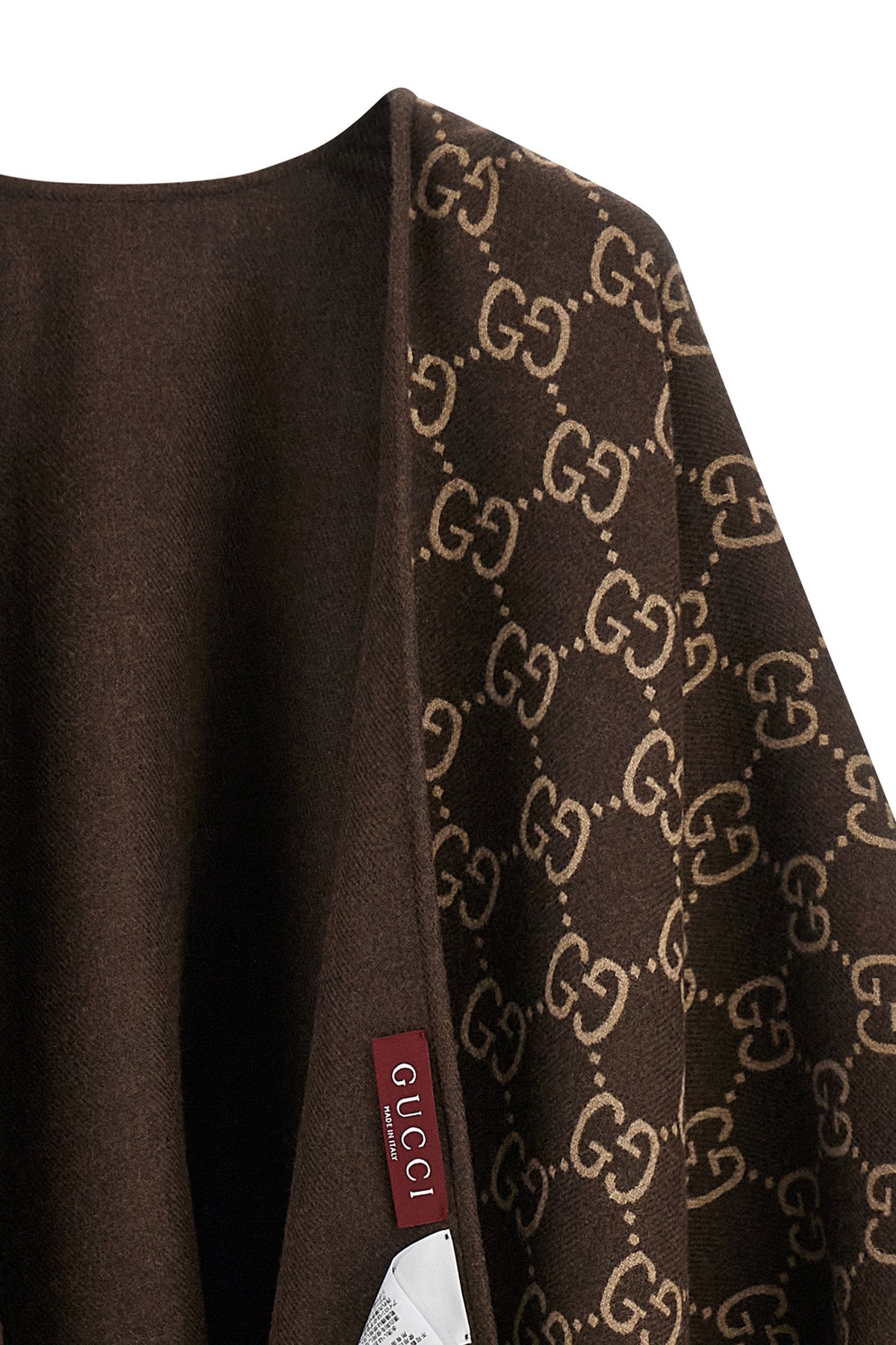 guccis gg jacquard pure wool cape defines a fluid and enveloping silhouette