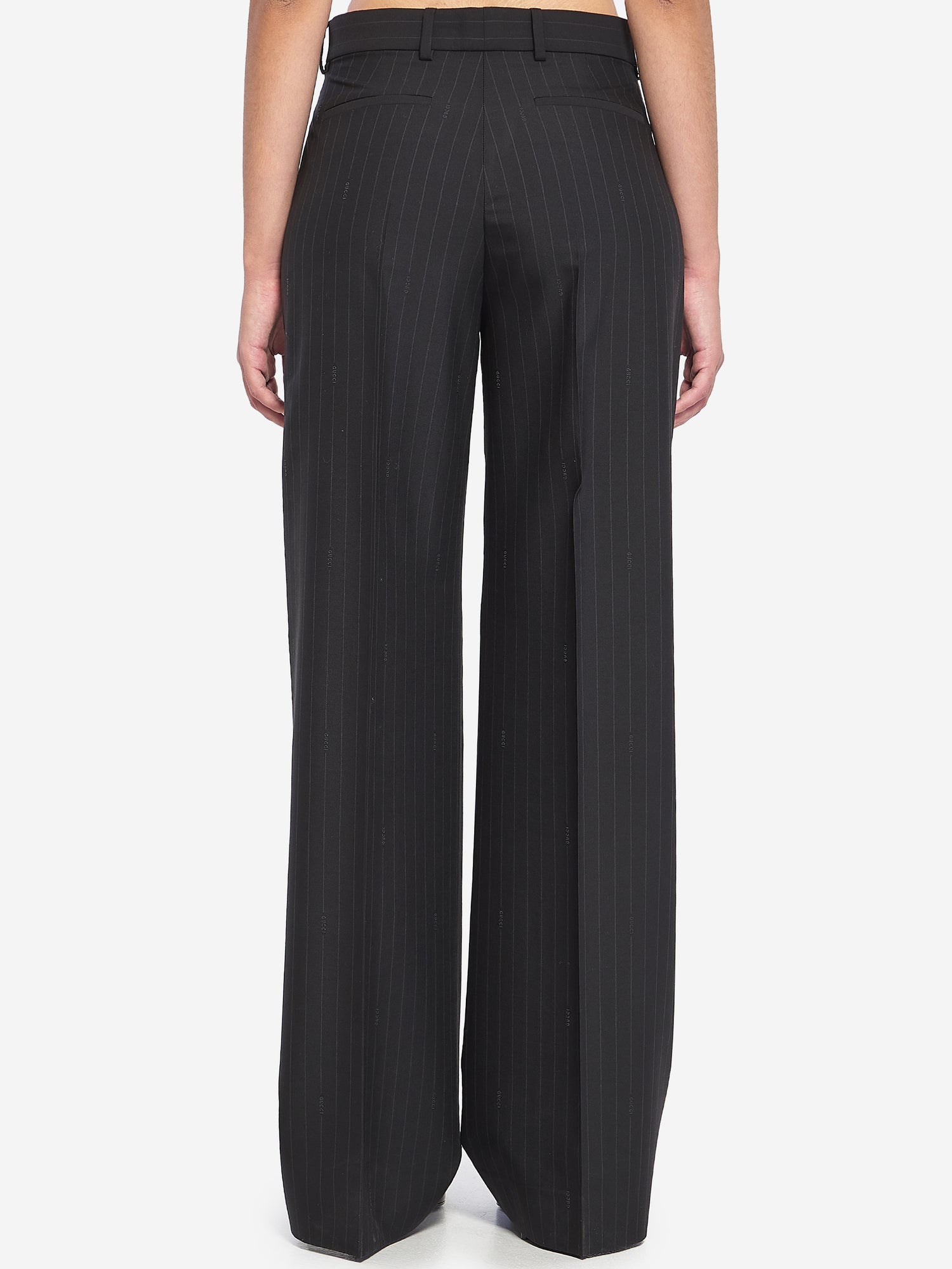 GUCCI 44 pinstriped wool trousers