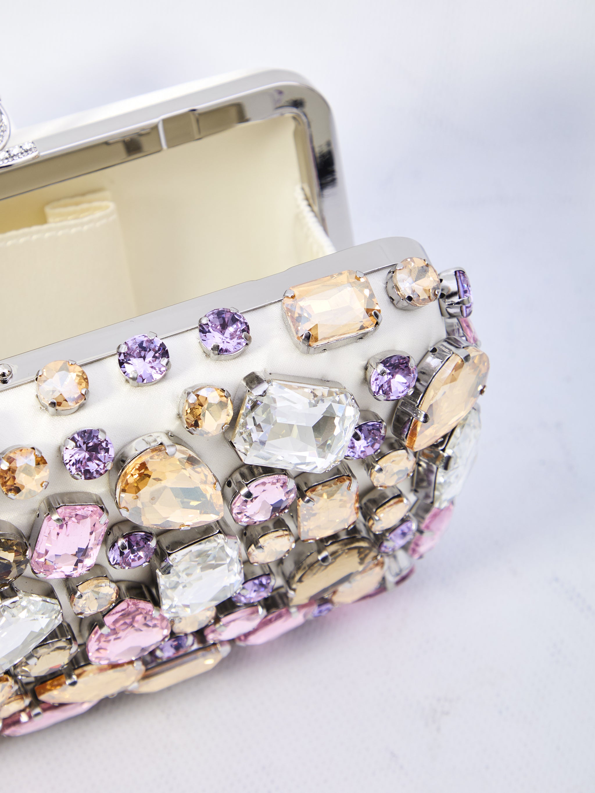 multi crystal embellished clutch bag