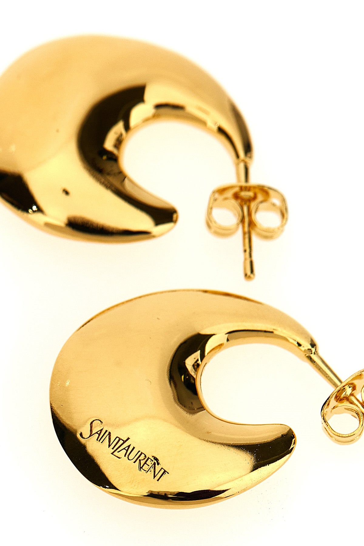 gold metal earring