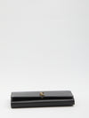 kate baguette clutch