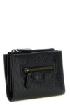 the bi-fold balenciaga le city wallet in arena lambskin leather stands out for