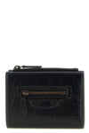 the bi-fold balenciaga le city wallet in arena lambskin leather stands out for