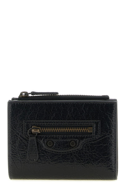 the bi-fold balenciaga le city wallet in arena lambskin leather stands out for