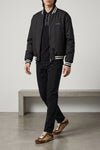 reversible bomber jacket in solid color technical nylon twill and gg pattern