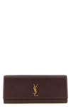 kate grain de poudre leather clutch