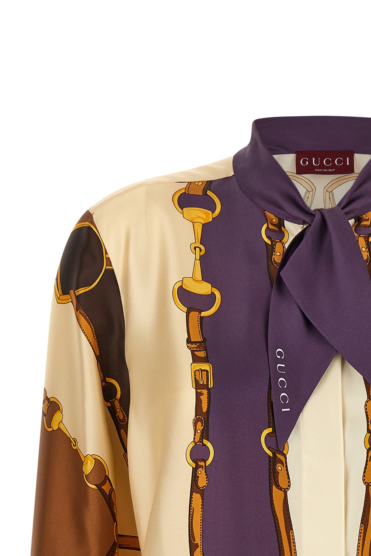 the gucci shirt exemplifies meticulous italian craftsmanship through its fluid c