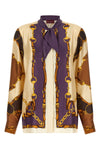 the gucci shirt exemplifies meticulous italian craftsmanship through its fluid c