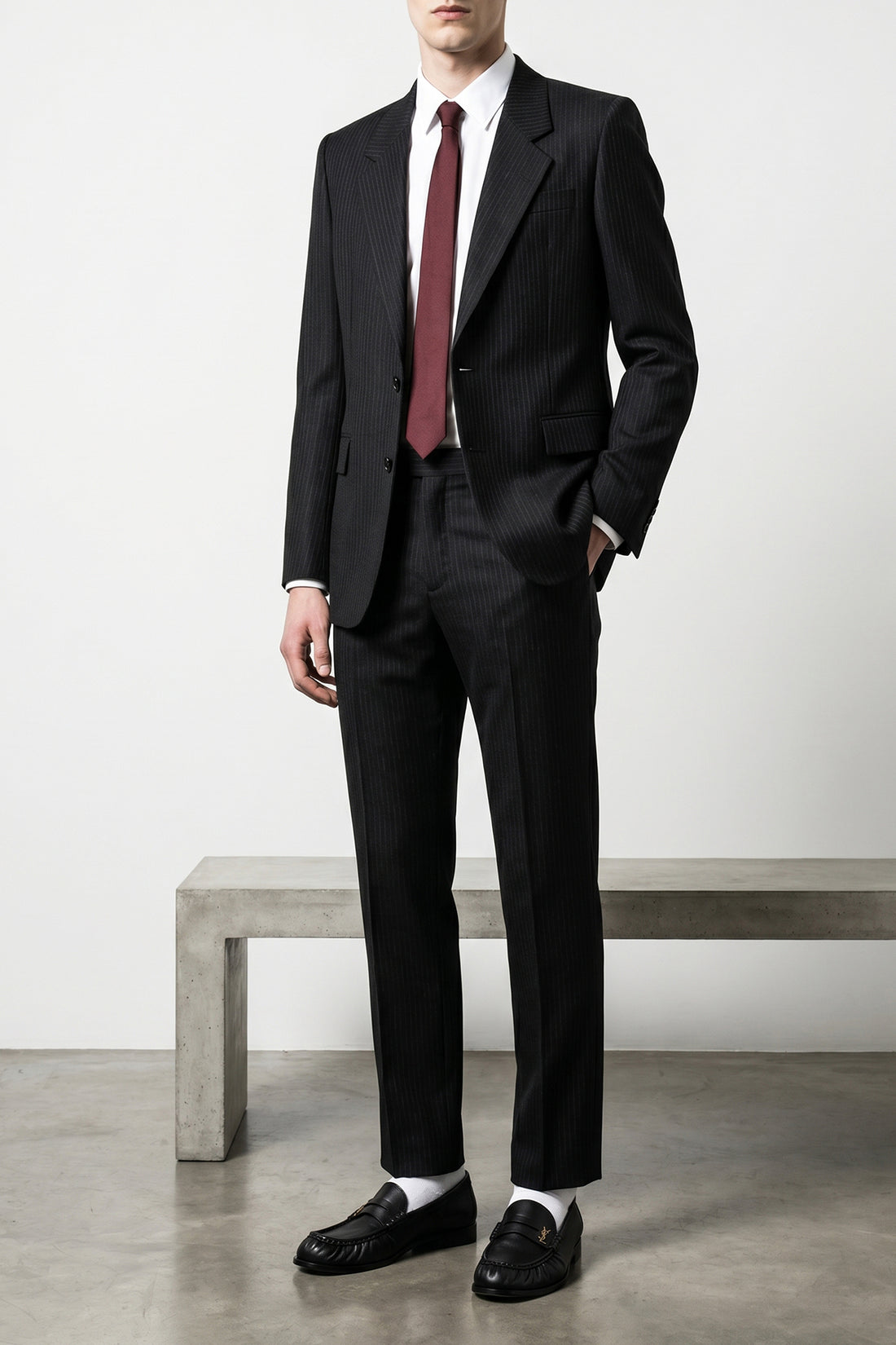 SAINT LAURENT 48 pinstriped patterned wool trousers