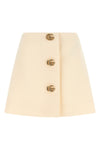 the gucci mini skirt in wool crêpe embodies a pure and structured sartorial aest