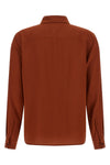 the saint laurent shirt in pure crepe de chine silk embodies a fluid and timeles