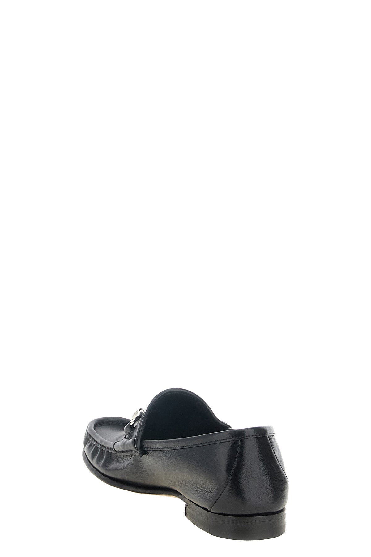 the gucci lugano loafers feature a structured interpretation of the classic sl
