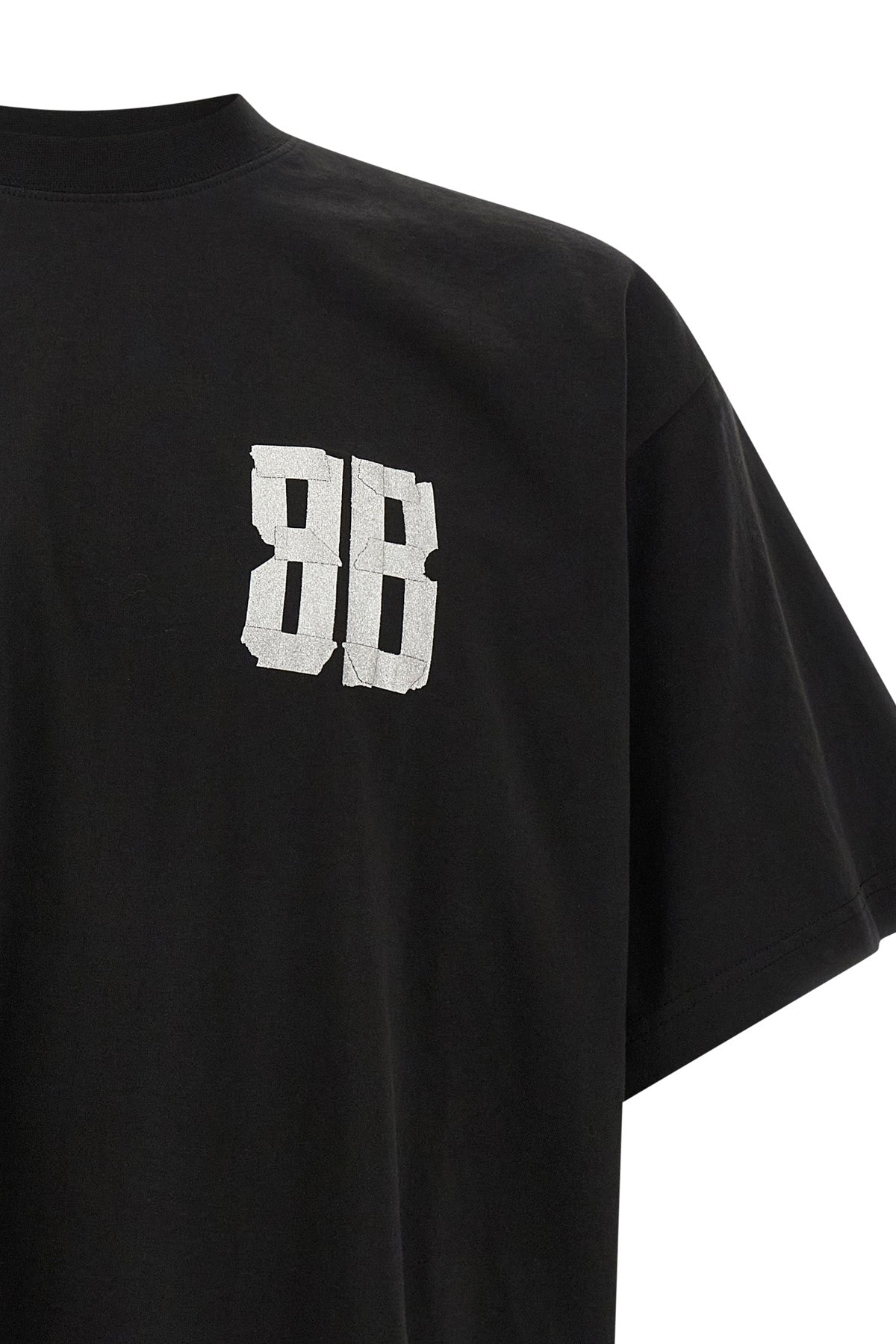 the balenciaga glitter tape type oversize t-shirt redefines the volumes of eve