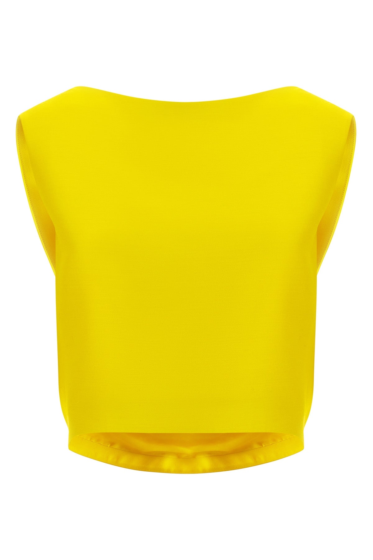 the balenciaga draped back top presents a rigorous study of sculptural contrasts