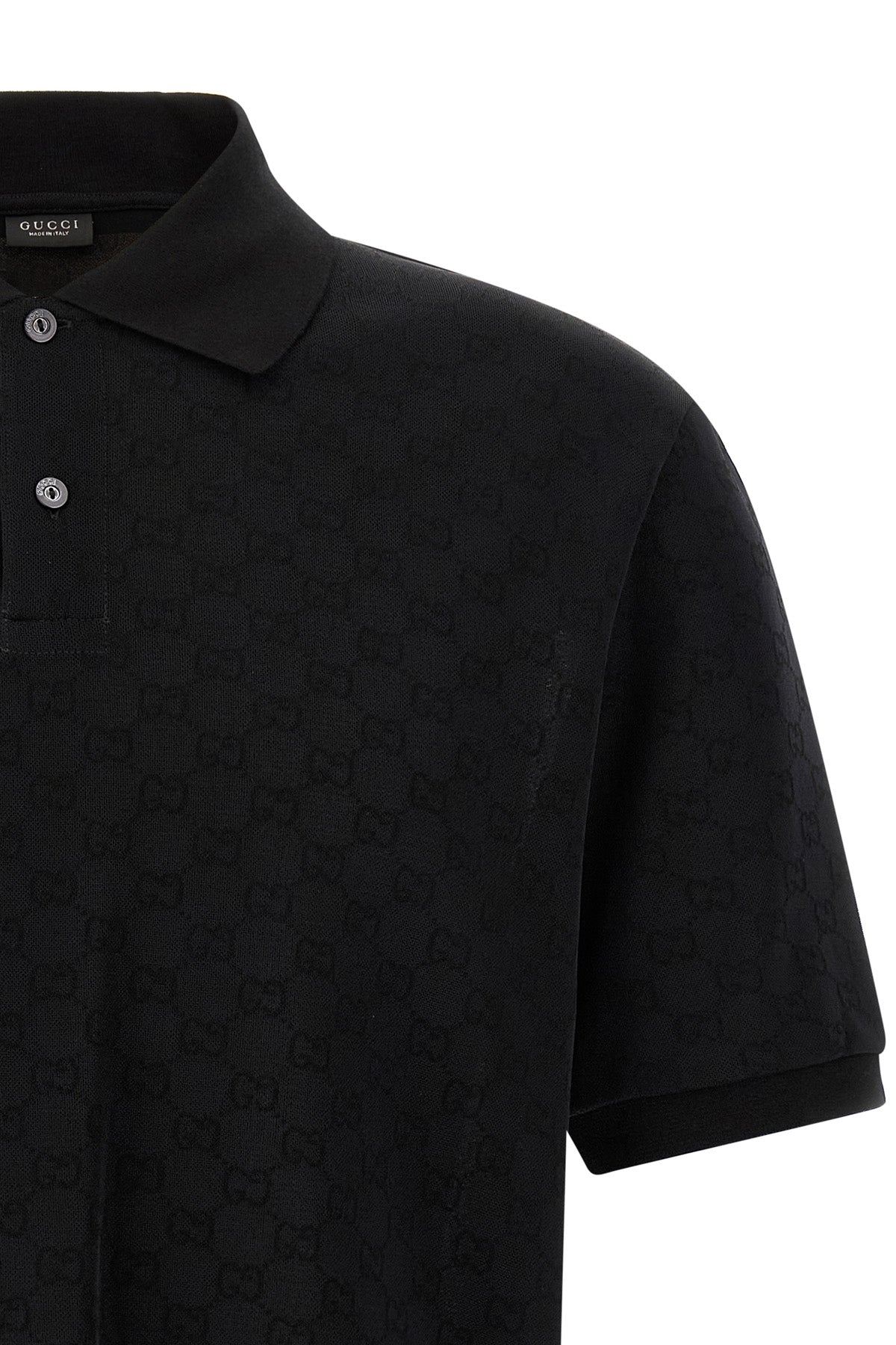 the black gucci polo shirt