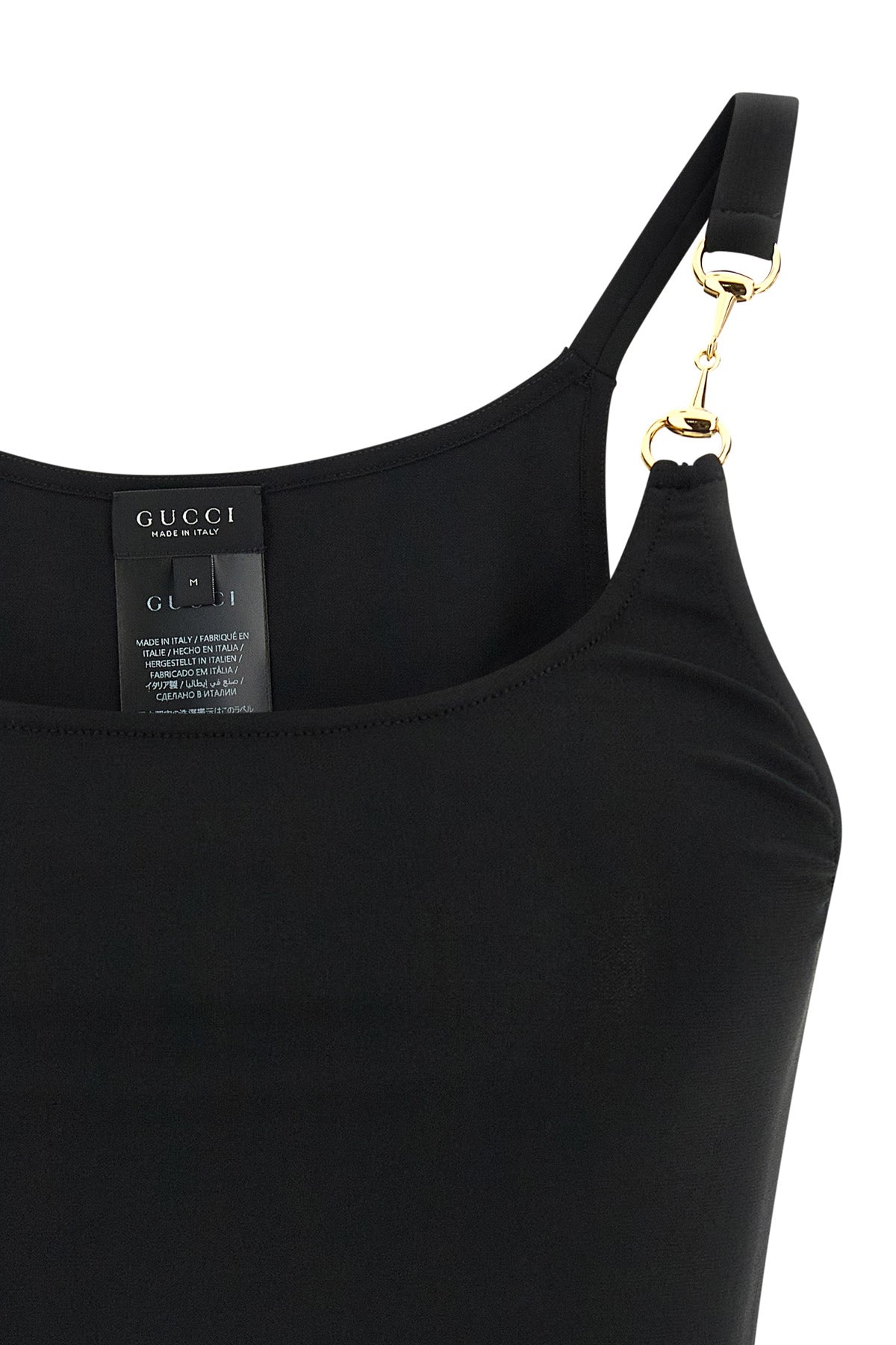 the gucci top redefines the essentiality of the wardrobe through an impeccable s