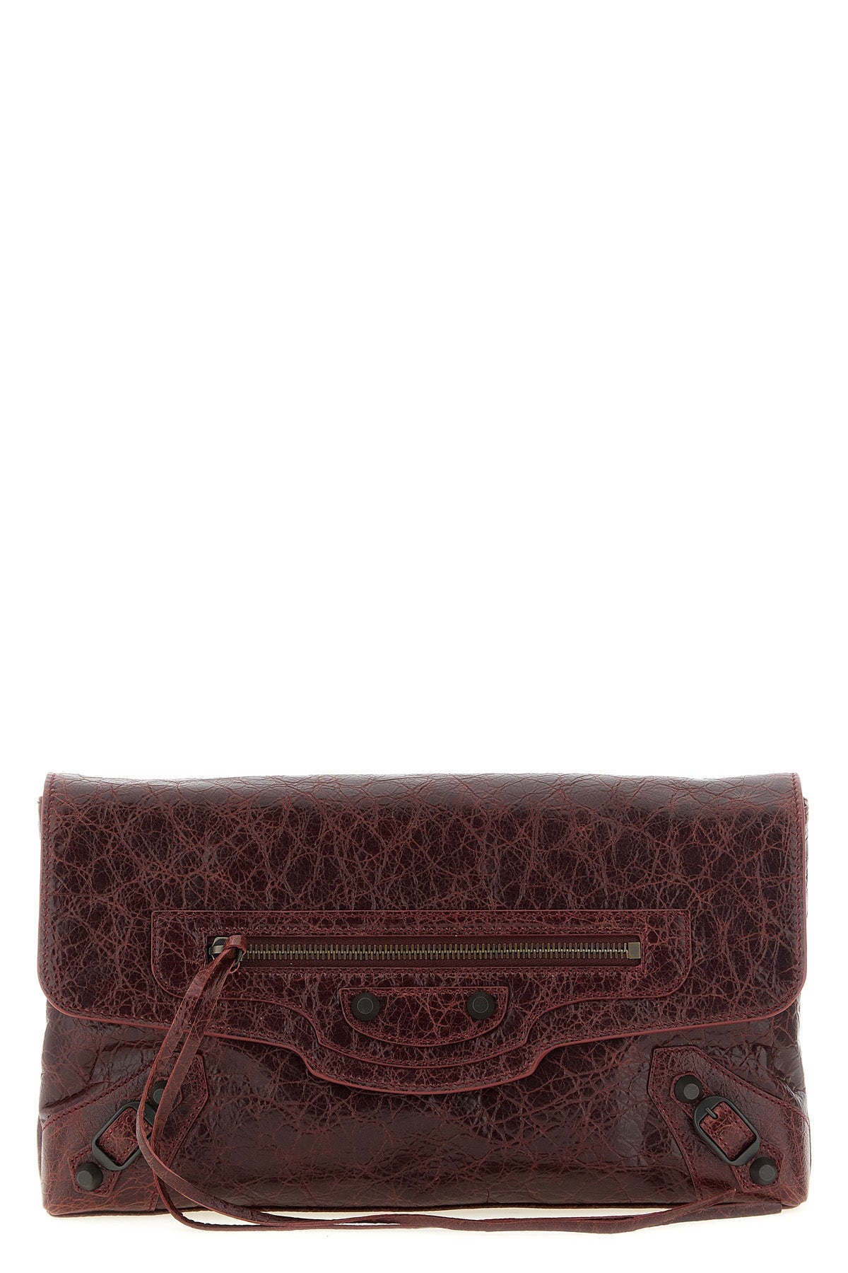 balenciagas le city clutch bag redefines urban elegance through a deconstruct