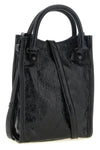 the balenciaga le city tote mobile phone bag translates the maisons iconic moto