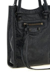 the balenciaga le city tote mobile phone bag translates the maisons iconic moto