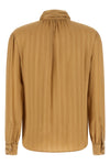 the saint laurent blouse defines fluid elegance through impeccable sartorial con