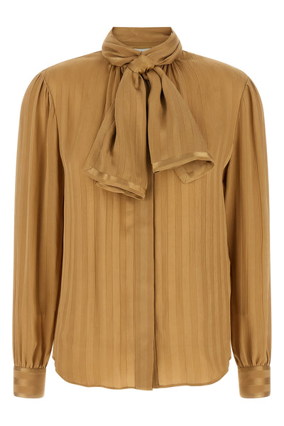the saint laurent blouse defines fluid elegance through impeccable sartorial con