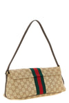 the gucci madison medium shoulder bag defines a structured rectangular silhoue