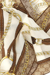 the gucci scarf redefines archival codes through a diamond silhouette