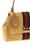 guccis paparazzo handbag sets new standards of craftsmanship excellence throu
