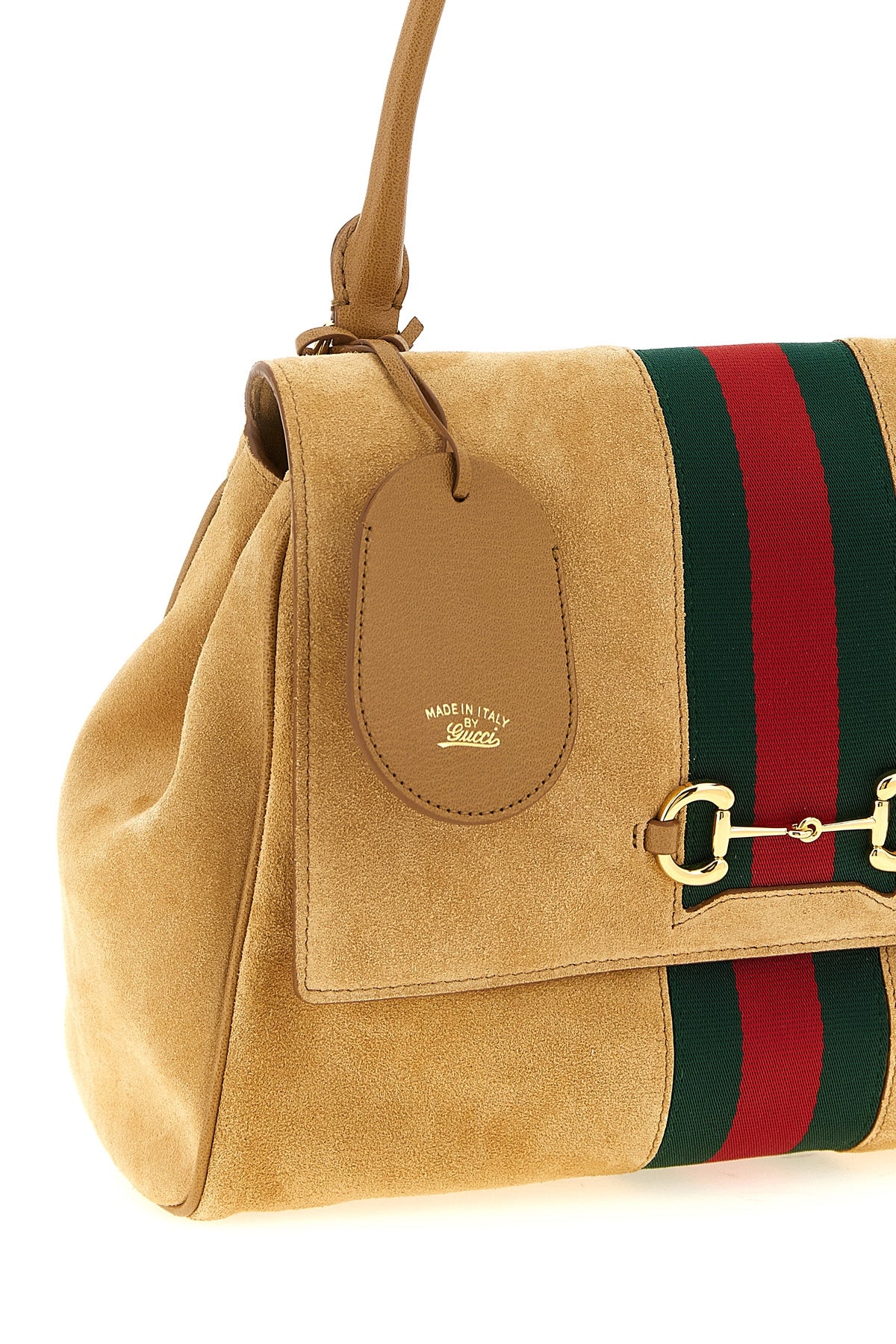 guccis paparazzo handbag sets new standards of craftsmanship excellence throu