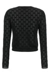 the gucci cardigan sets new standards of elegance through a shortened and tight