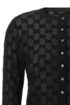 the gucci cardigan sets new standards of elegance through a shortened and tight