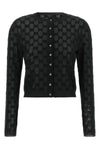 the gucci cardigan sets new standards of elegance through a shortened and tight