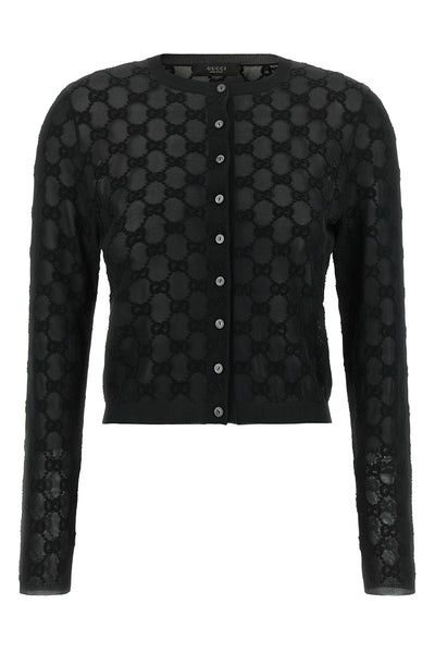the gucci cardigan sets new standards of elegance through a shortened and tight