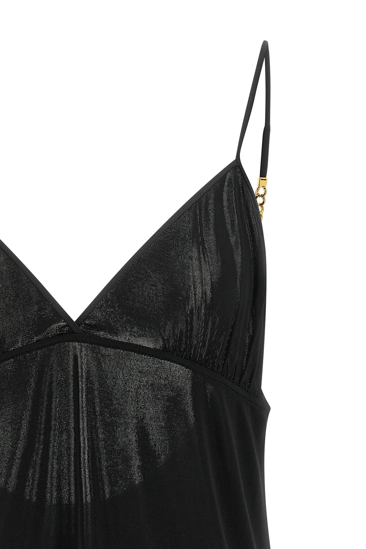 the saint laurent top redefines evening wear through precise sartorial construct