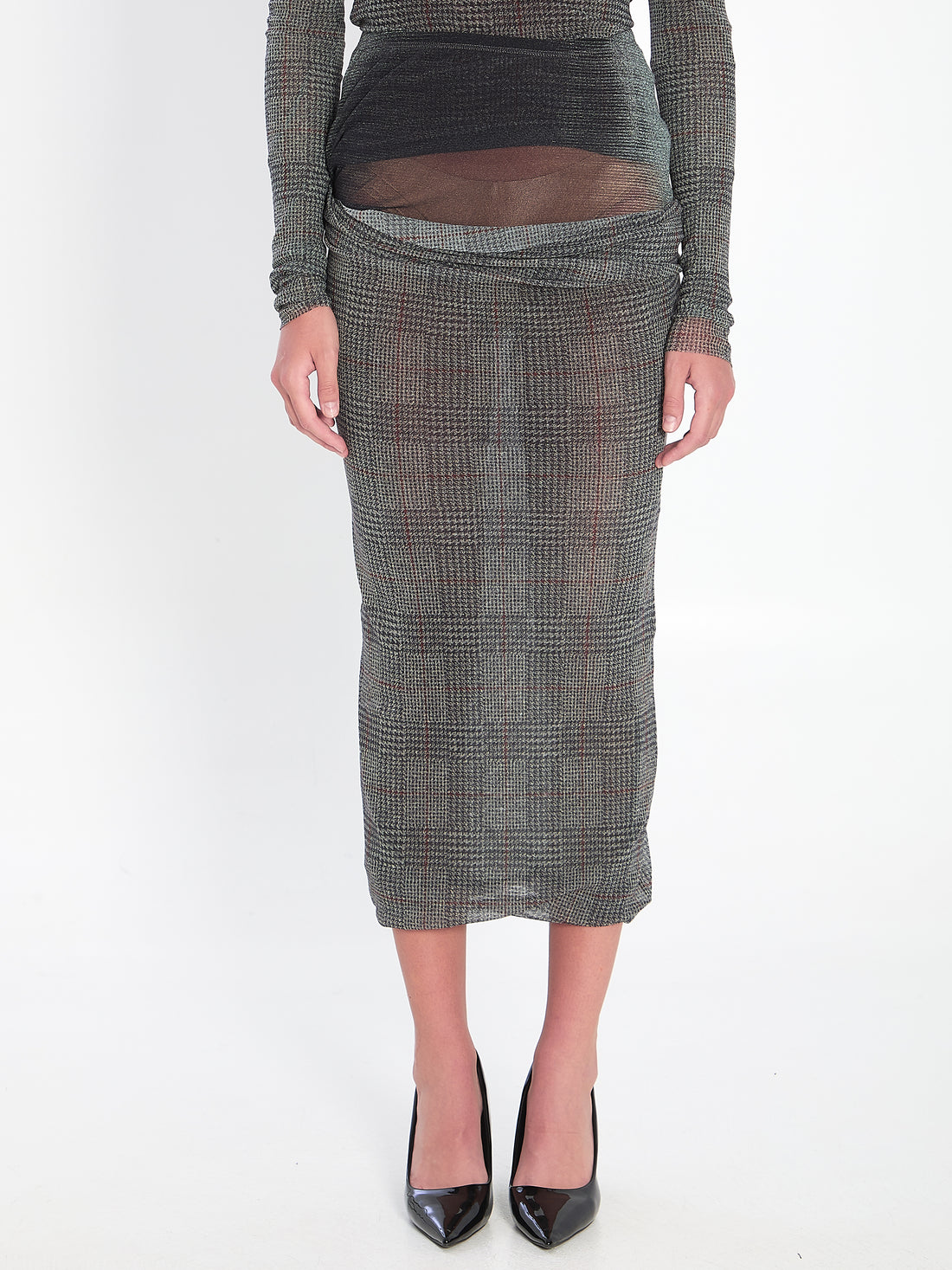 JEAN PAUL GAULTIER S body shadow and prince of wales skirt