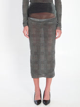 JEAN PAUL GAULTIER S body shadow and prince of wales skirt