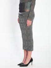 JEAN PAUL GAULTIER S body shadow and prince of wales skirt