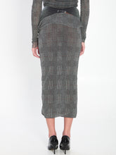 JEAN PAUL GAULTIER S body shadow and prince of wales skirt