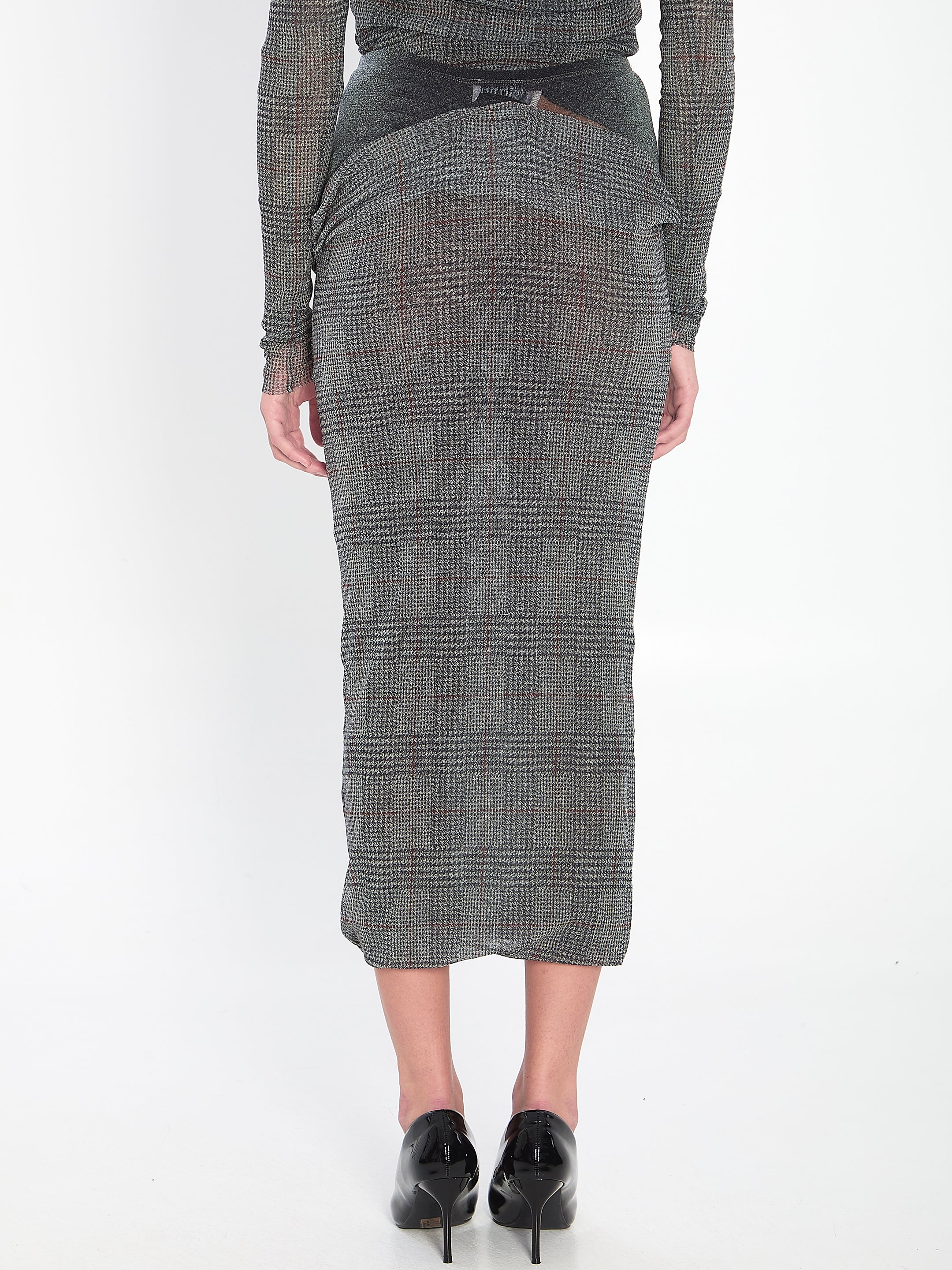 JEAN PAUL GAULTIER S body shadow and prince of wales skirt