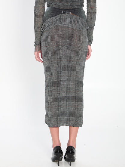 JEAN PAUL GAULTIER S body shadow and prince of wales skirt