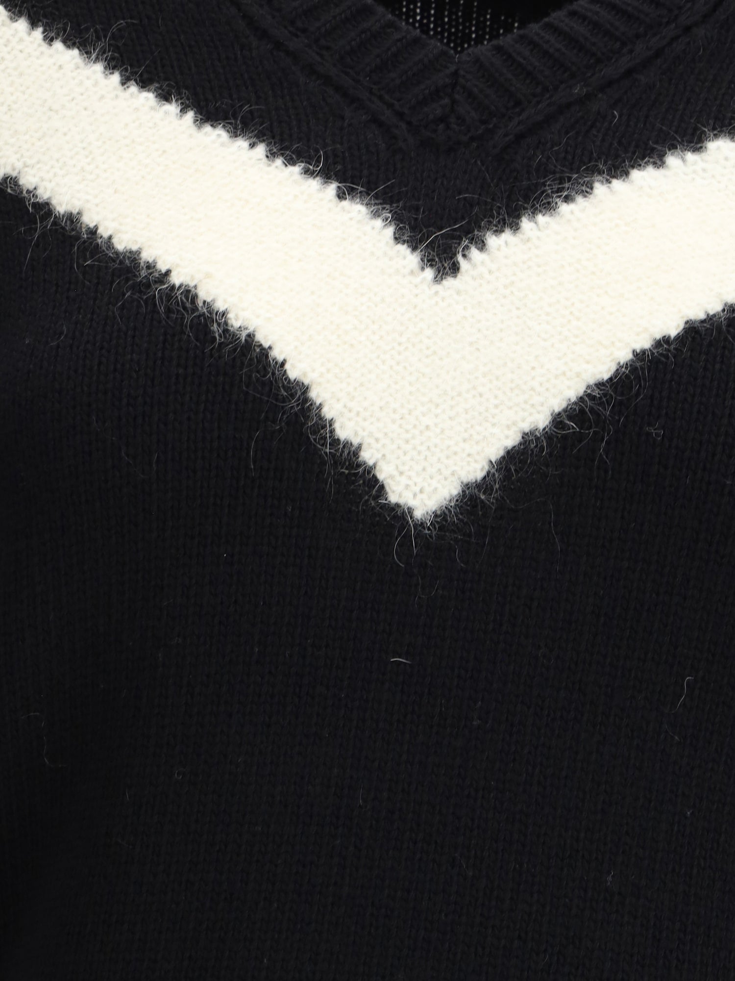 VALENTINO M wool sweater with a bow at the back