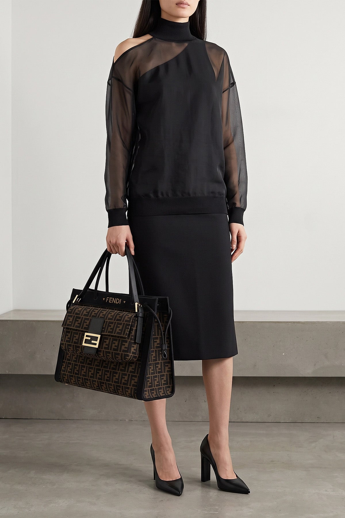 the large fendi magic shopping bag is distinguished by a structured and capaci