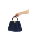 peekaboo mini denim handbag