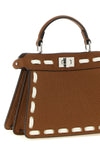 the fendi peekaboo iseeu handbag is made of brown cuoio romano leather