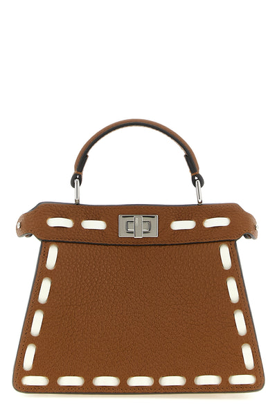 the fendi peekaboo iseeu handbag is made of brown cuoio romano leather