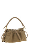 the fendi baguette®  soft piccola handbag redefines the codes of the maison th