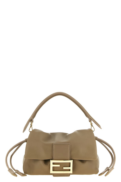 the fendi baguette®  soft piccola handbag redefines the codes of the maison th