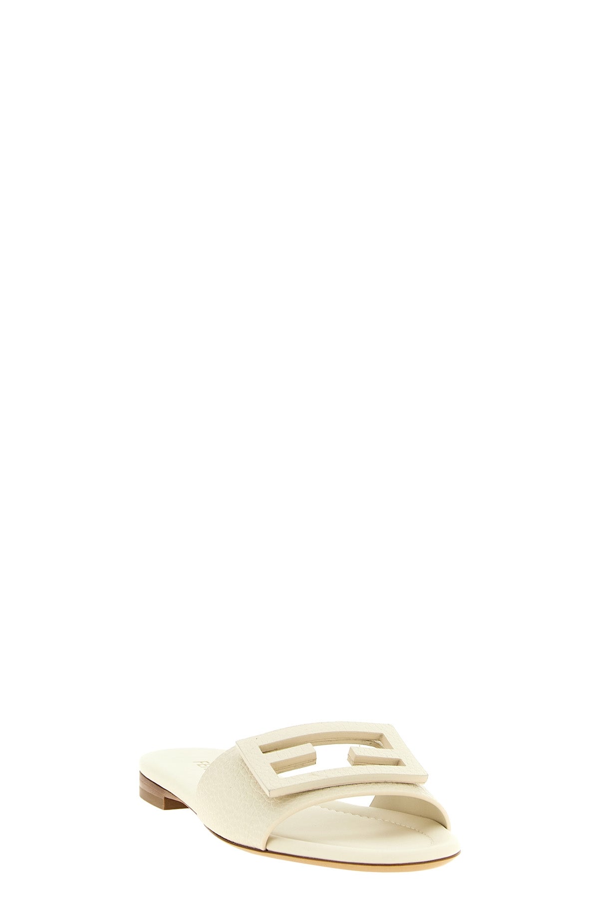 the fendi tube slides embody essential elegance through a flat silhouette